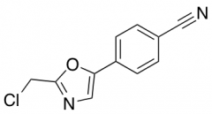 4-[2-(chloromethyl)-1,3-oxazol-5-yl]benzonitrile