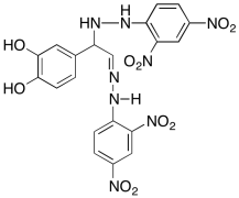 4-(1-(2-(2,4-Dinitrophenyl)hydrazinyl)-2-(2-(2,4-dintrophenyl)hydrazono)ethyl)benzene-1,2-