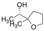 (1S)-1-(2-methyloxolan-2-yl)ethan-1-ol